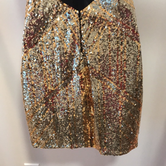 Bebe sequin dress. Low front plunge with a mesh back. - Picture 7 of 10